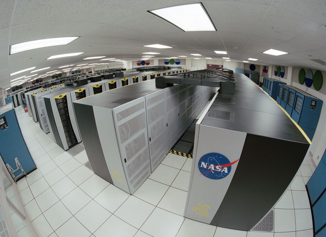 Racks of the Columbia supercomputer lined up in a NASA machine room, blue and white cabinets